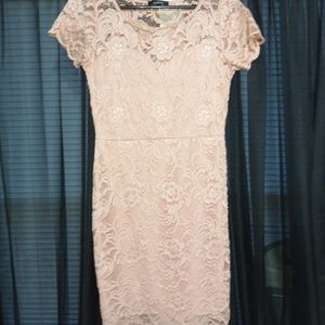 Knee high lace dress pink in color very good condi